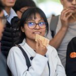 Estudiantes transfronterizos cruzando la frontera entre Tijuana y San Diego